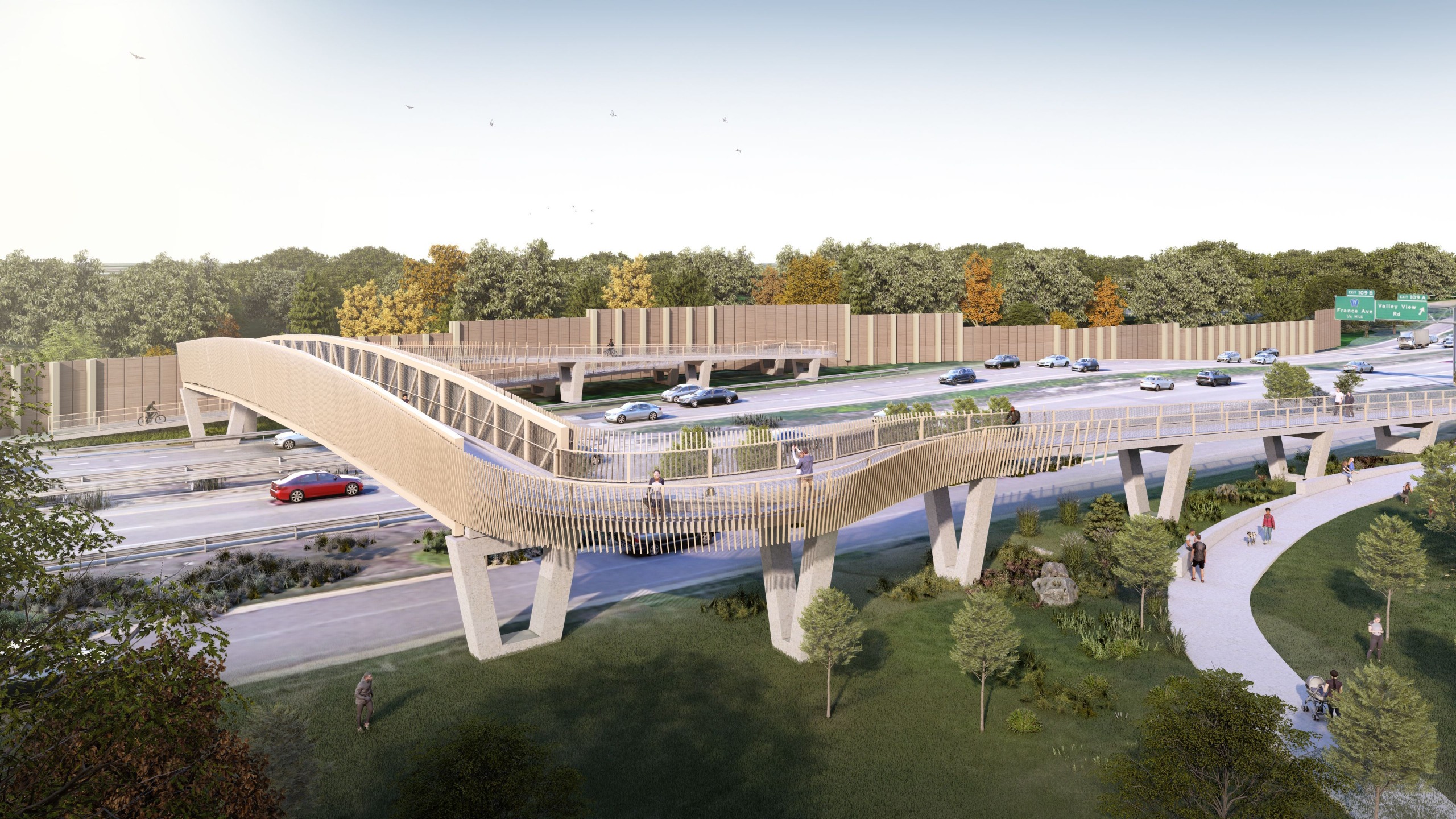 After: Rendering of the new replacement bridge, which shows ramps on both sides of the highway and decorative steel cladding.