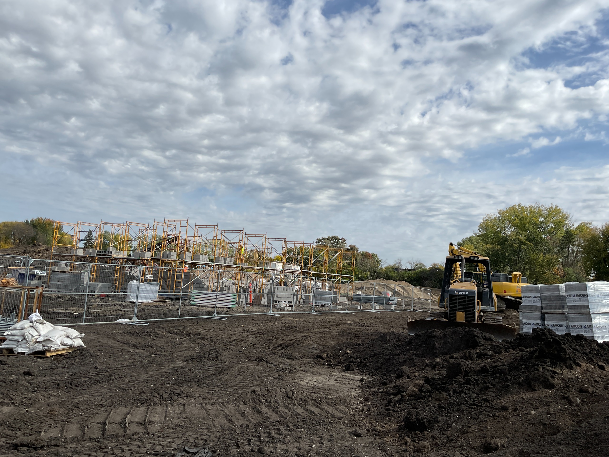 Masonry crew assembling walls at Fred Richards Park