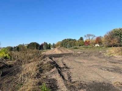 exposed golf fairway strip showing sandy loam imported material